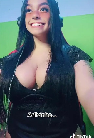 6. Alluring Karniello Shows Cleavage in Erotic Black Bodysuit and Bouncing Boobs