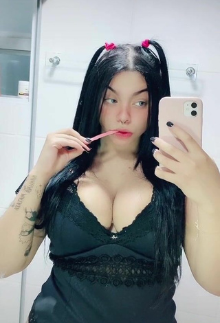 Sexy Karniello Shows Cleavage in Black Bodysuit and Bouncing Tits