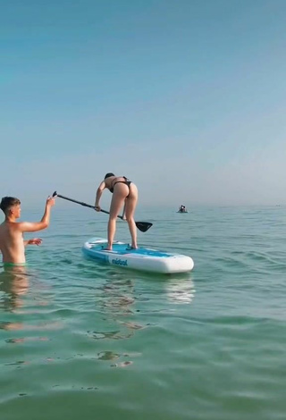 4. Sexy Kiara Brunett in Thong in the Sea