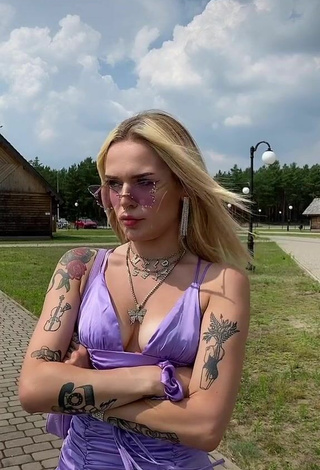 Sexy Klaudia Bieszcz Shows Cleavage in Violet Dress