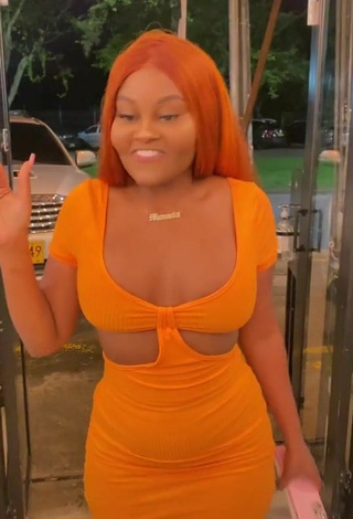 Cute Lajesuu Shows Cleavage in Orange Dress