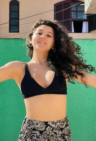 5. Sexy Lorena Tucci Shows Cleavage in Black Bikini Top