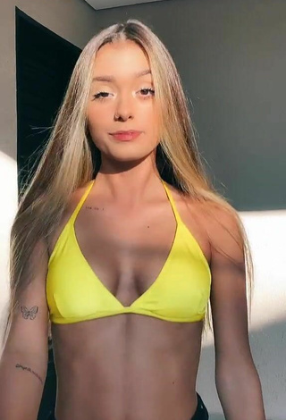 Luane Guiné Looks Erotic in Yellow Bikini Top