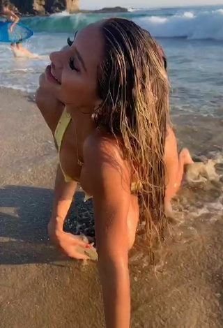 3. Seductive Mariana Morais Shows Cleavage in Yellow Bikini at the Beach