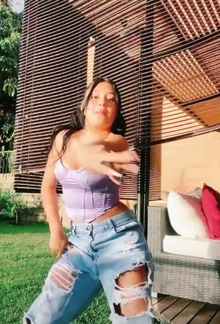 3. Beautiful Mafe Vásquez Shows Cleavage in Sexy Purple Crop Top
