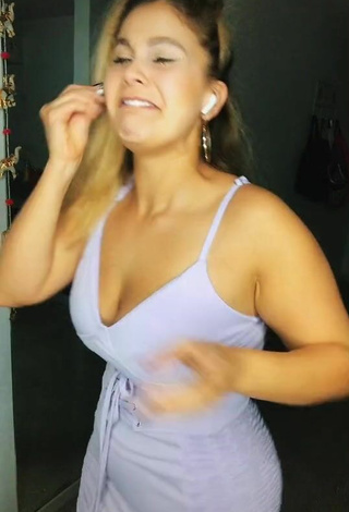 4. Sexy Micad Fuego Shows Cleavage in White Dress