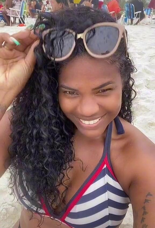 2. Cute Michele Oliveira in Striped Bikini Top at the Beach