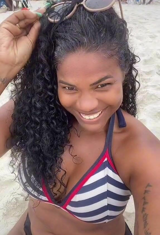 3. Cute Michele Oliveira in Striped Bikini Top at the Beach