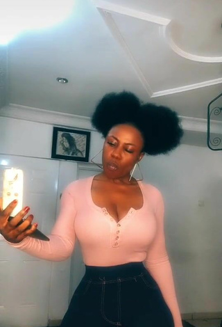 Hot Lilly Chioma Shows Cleavage in Pink Top