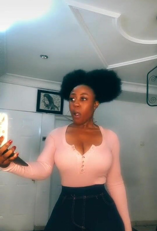3. Hot Lilly Chioma Shows Cleavage in Pink Top