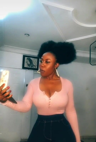 4. Hot Lilly Chioma Shows Cleavage in Pink Top