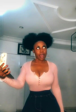 5. Hot Lilly Chioma Shows Cleavage in Pink Top