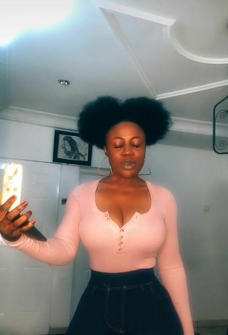6. Hot Lilly Chioma Shows Cleavage in Pink Top