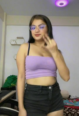 3. Hot Marylaine Amahit Shows Cleavage in Purple Crop Top