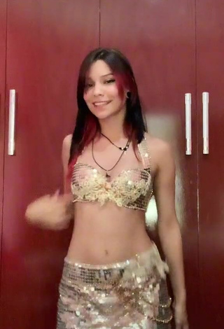 1. Sexy Ni.nique in Golden Crop Top while doing Belly Dance