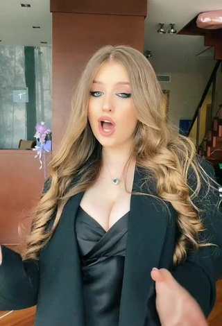 2. Sexy Viktoria Nikulina Shows Cleavage in Black Dress