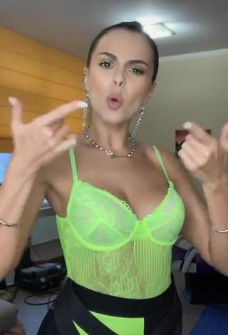 5. Sexy Nastia Kamenskykh Shows Cleavage in Lime Green Bodysuit