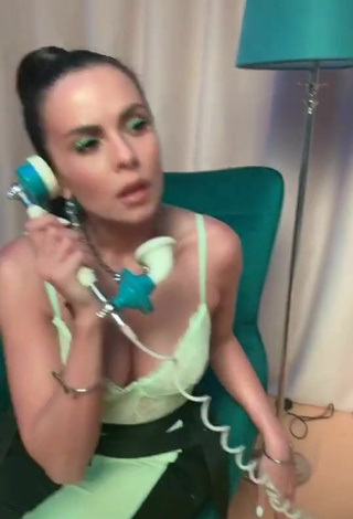 Sexy Nastia Kamenskykh Shows Cleavage in Lime Green Top