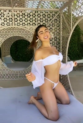 2. Sexy Paula Galindo Shows Cleavage in White Crop Top at the Pool