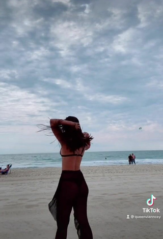 4. Hot Virgie Ann Casteel in Black Bikini Top at the Beach