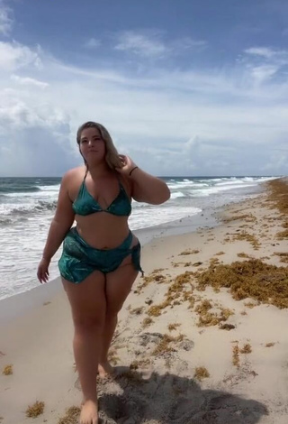 3. Erotic Sam Paige Shows Cleavage in Green Bikini at the Beach