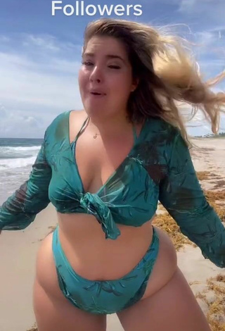 6. Hottie Sam Paige Shows Cleavage in Green Bikini at the Beach