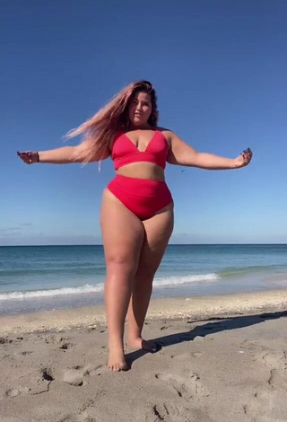 Cute Sam Paige Shows Cleavage in Red Bikini at the Beach