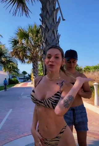 3. Sasha Ferro Shows Cleavage in Sweet Zebra Bikini in a Street