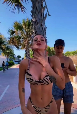4. Sasha Ferro Shows Cleavage in Sweet Zebra Bikini in a Street