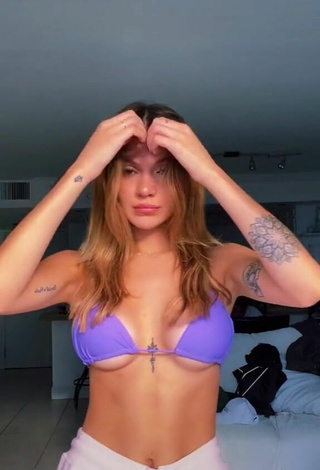 Hottie Sasha Ferro Shows Cleavage in Purple Bikini Top