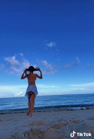 3. Sexy Sasha Ferro Shows Cleavage in Blue Bikini at the Beach