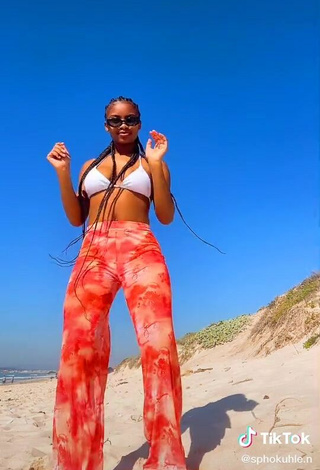 6. Sexy Sphokuhle.n Shows Cleavage in White Bikini Top at the Beach