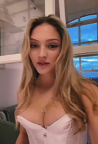 3. Sexy India Rawsthorn Shows Cleavage in White Corset