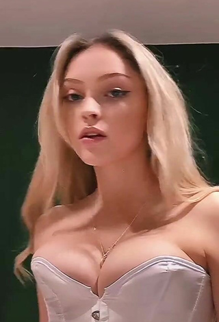 6. Sexy India Rawsthorn Shows Cleavage in White Corset