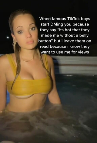 2. Sexy Tori V Shows Cleavage in Yellow Bikini Top at the Swimming Pool