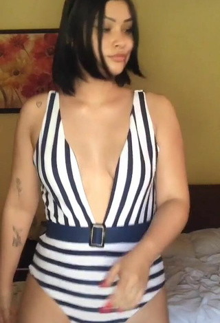 Sexy Valeria Figueroa Shows Cleavage in Striped Swimsuit