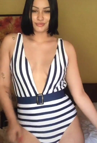 2. Sexy Valeria Figueroa Shows Cleavage in Striped Swimsuit