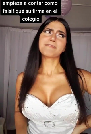 5. Sexy Violetta Ortiz Shows Cleavage in White Dress
