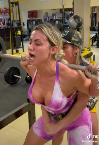 4. Beautiful Vivi Winkler Shows Cleavage in Sexy Overall in the Sports Club while doing Fitness Exercises
