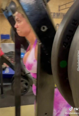 5. Beautiful Vivi Winkler Shows Cleavage in Sexy Overall in the Sports Club while doing Fitness Exercises