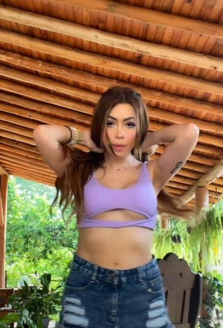 1. Sexy Yazmin Andreina in Violet Bikini Top