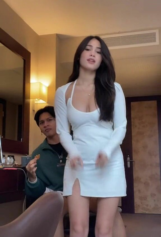 3. Sexy Aaliyah De Gracia Shows Cleavage in White Dress