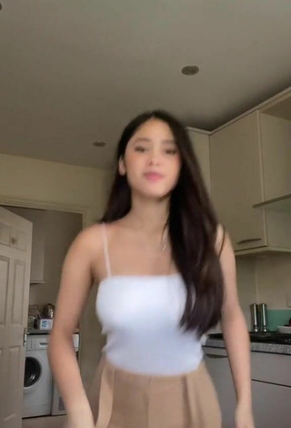 Sexy Aaliyah De Gracia Shows Cleavage in White Top Braless