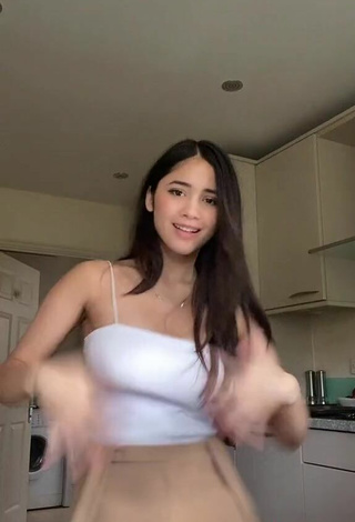 3. Sexy Aaliyah De Gracia Shows Cleavage in White Top Braless