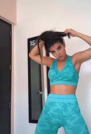 2. Sexy Adriana Daabub in Turquoise Sport Bra