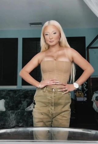 3. Sexy Alabama Barker Shows Cleavage in Beige Corset
