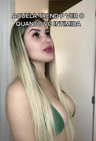 Cute Alannis Proença Shows Cleavage in Green Bikini Top