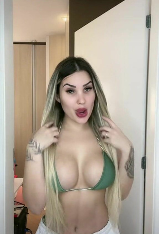2. Hot Alannis Proença Shows Cleavage in Green Bikini Top
