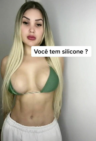 6. Sexy Alannis Proença Shows Cleavage in Green Bikini Top