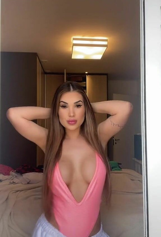 4. Cute Alannis Proença Shows Cleavage in Pink Swimsuit